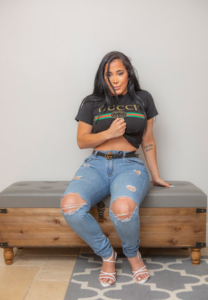 Hot Latina amateur Carla White removes her sexy bra to show big tits & nipples